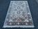 Hand-knotted Persian silk rug