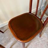 2 bistro chairs in arched and dark wood