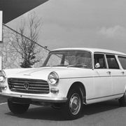 Large framed photograph of a Peugeot 404 estate car