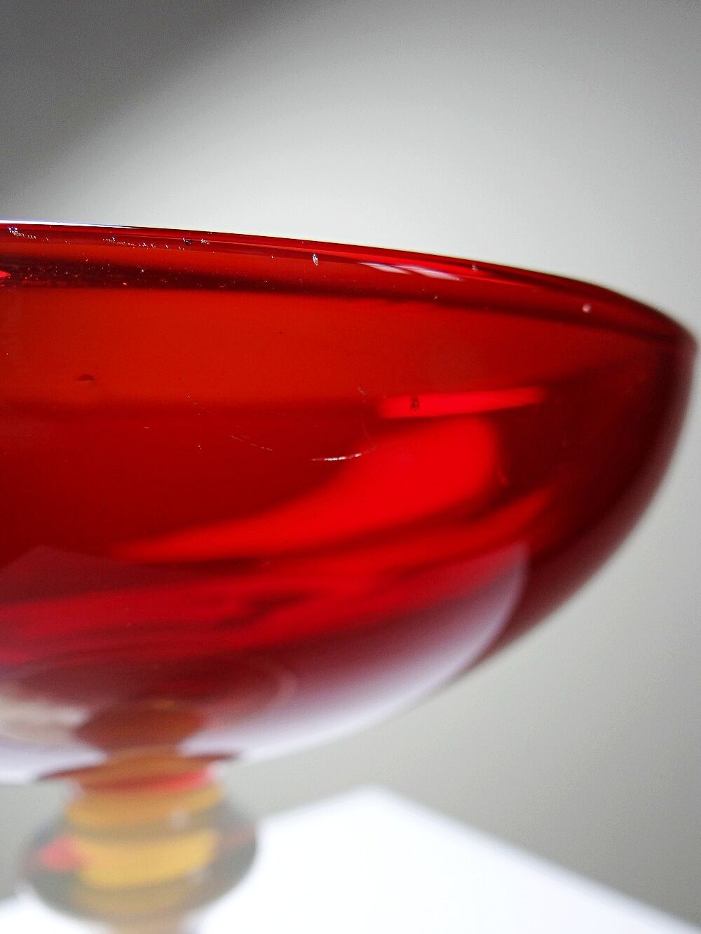 Red Venetian blown glass coupe on a foot with opaline and vintage soap bubble.