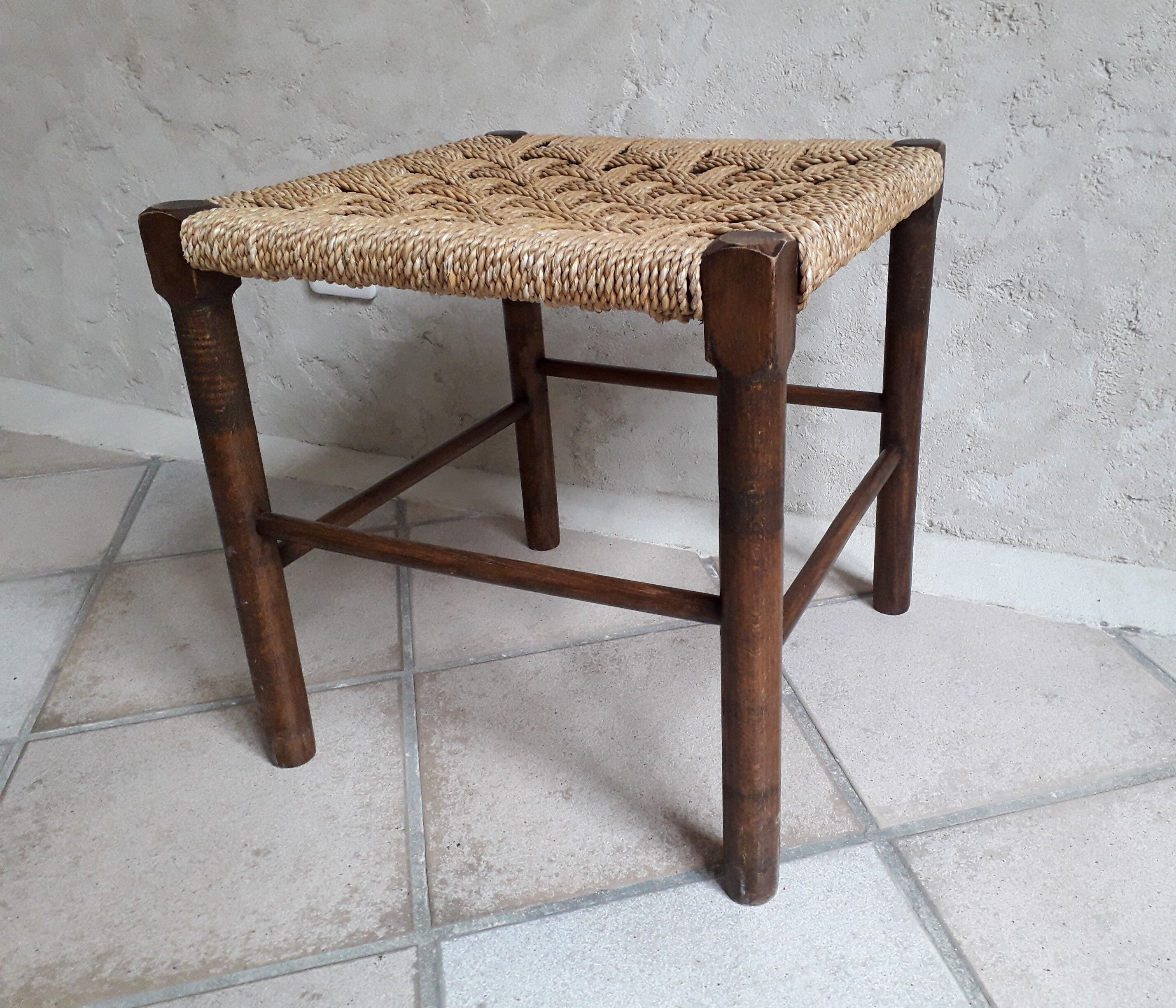 Wooden stool and rope