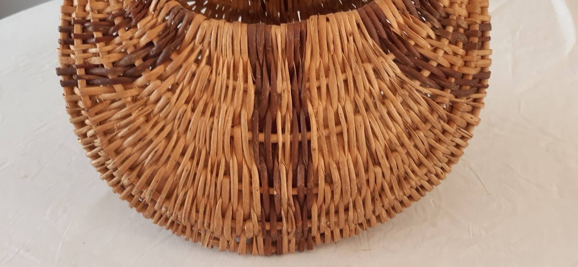 Old banana basket with wicker two colors