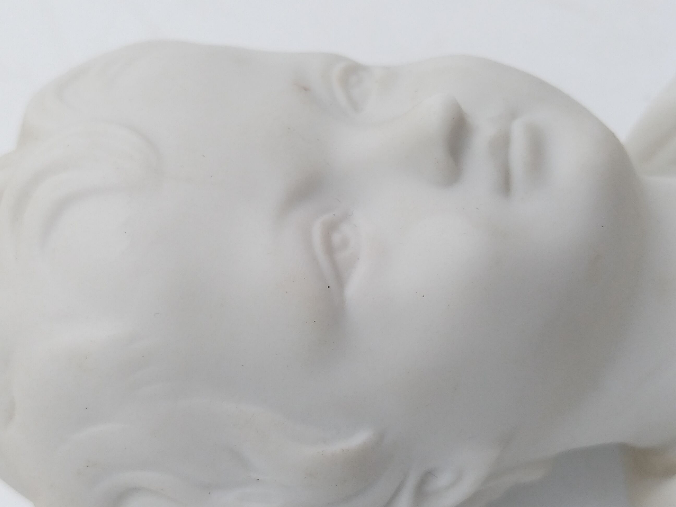 Child bust in biscuit. Capodimonte .