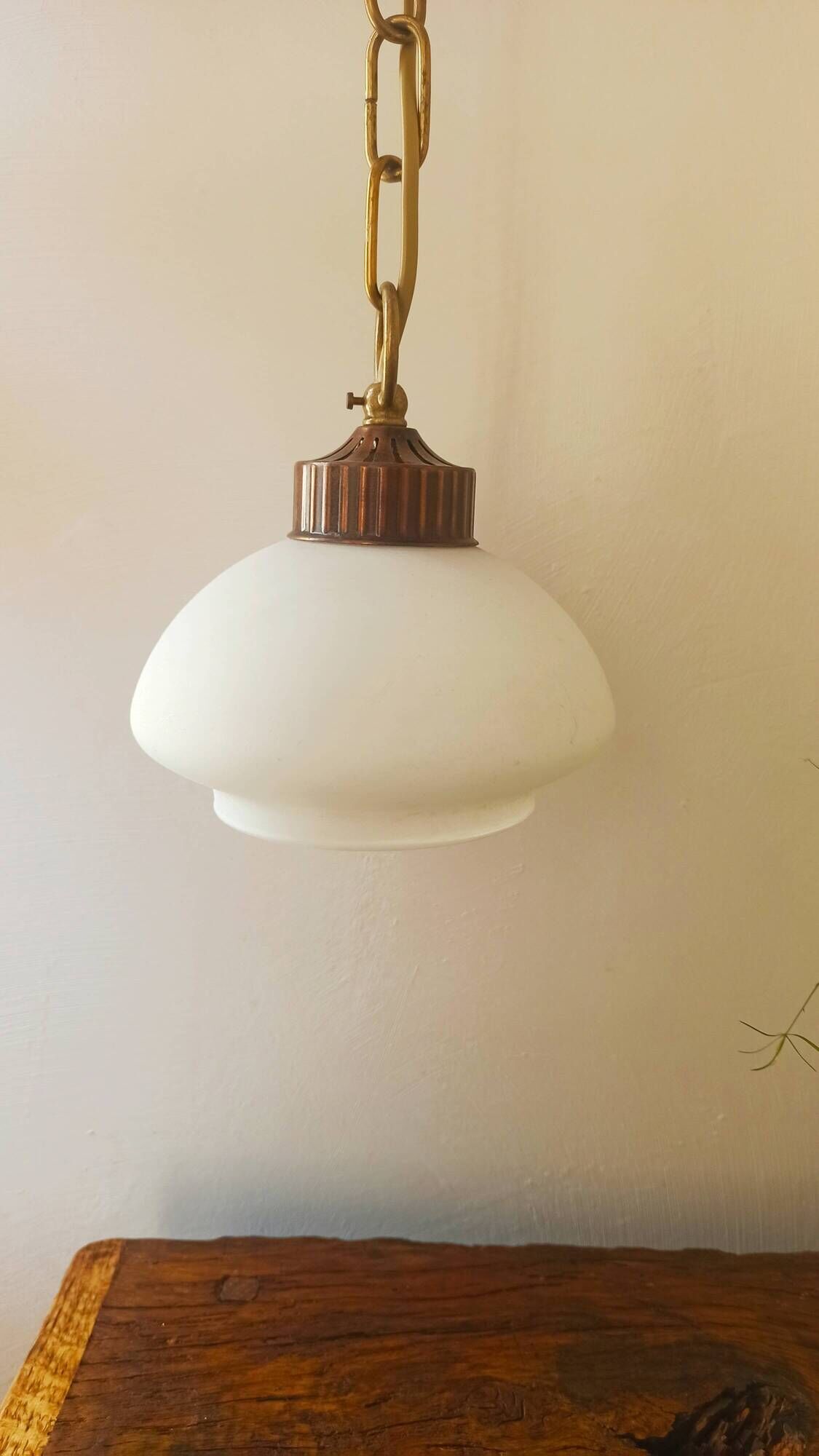 Chandelier, brass suspension and white opal.
