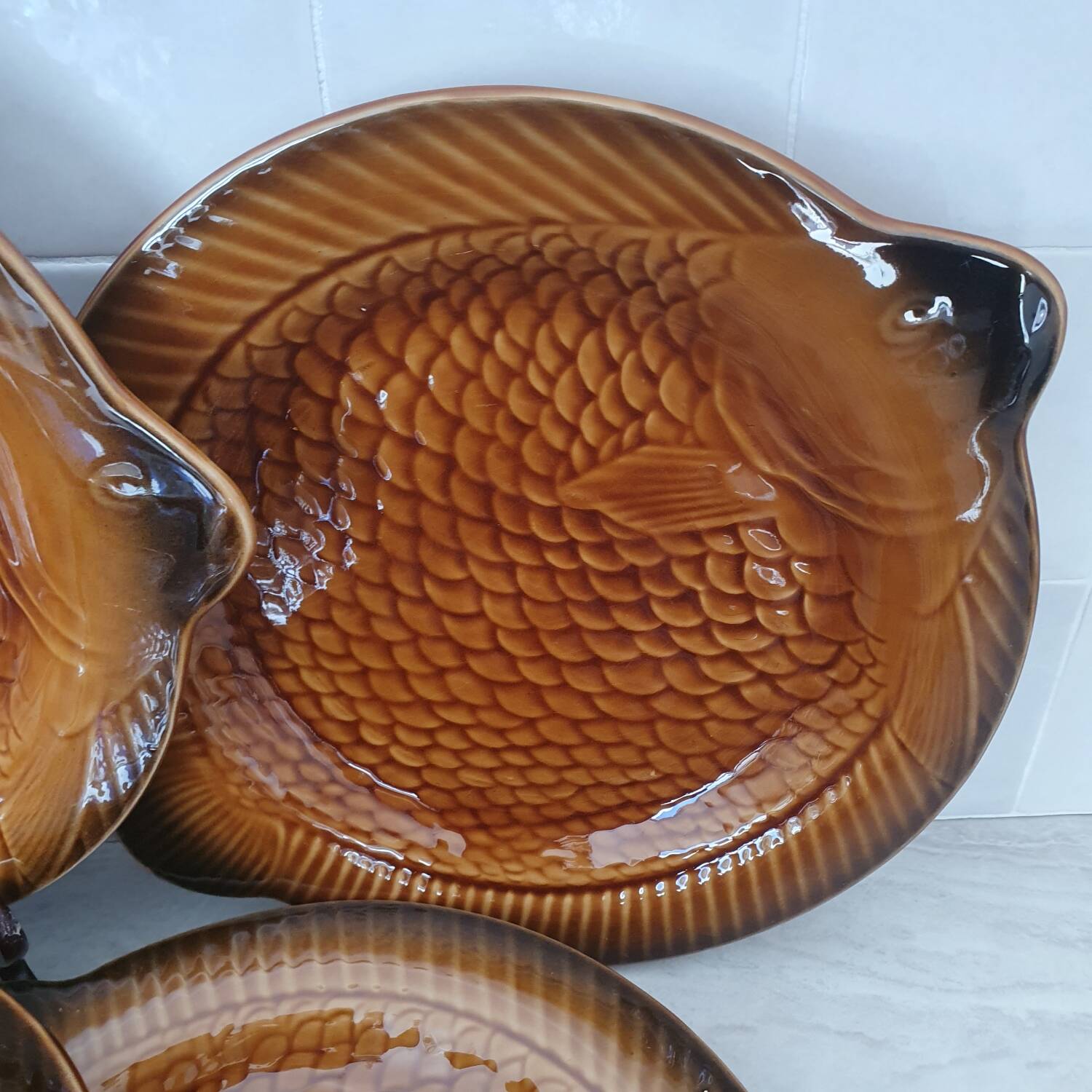 Sarreguemines / 11 earthenware fish-shaped plates