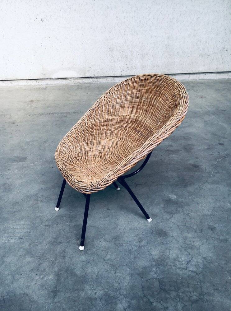 Wicker lounge chair in the style of Dirk Van Sliedregt for Rohé Noordwolde, Netherlands, 1960s.