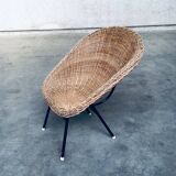 Wicker lounge chair in the style of Dirk Van Sliedregt for Rohé Noordwolde, Netherlands, 1960s.