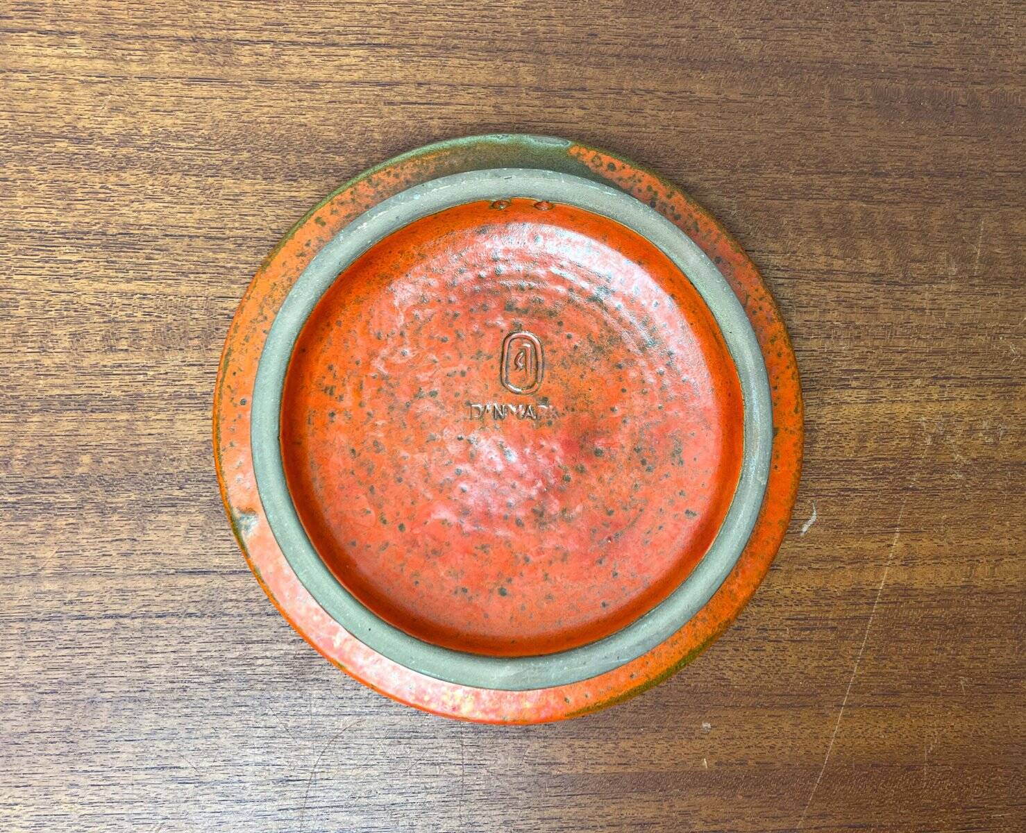 Mid-century modern Danish studio pottery, orange wall coat rack by Signe Boesen Northroup, 1960s.