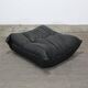 Togo armchair and footrest in black leather by Ligne Roset, designed by Michel Ducaroy.