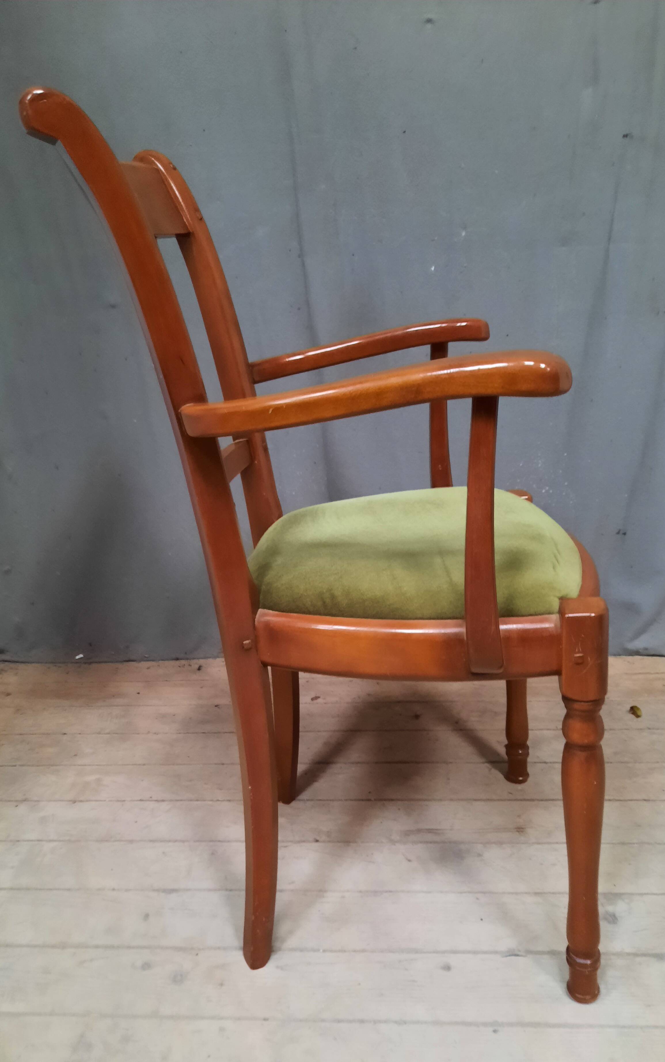 Modern armchair in varnished wood