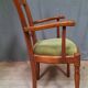 Modern armchair in varnished wood