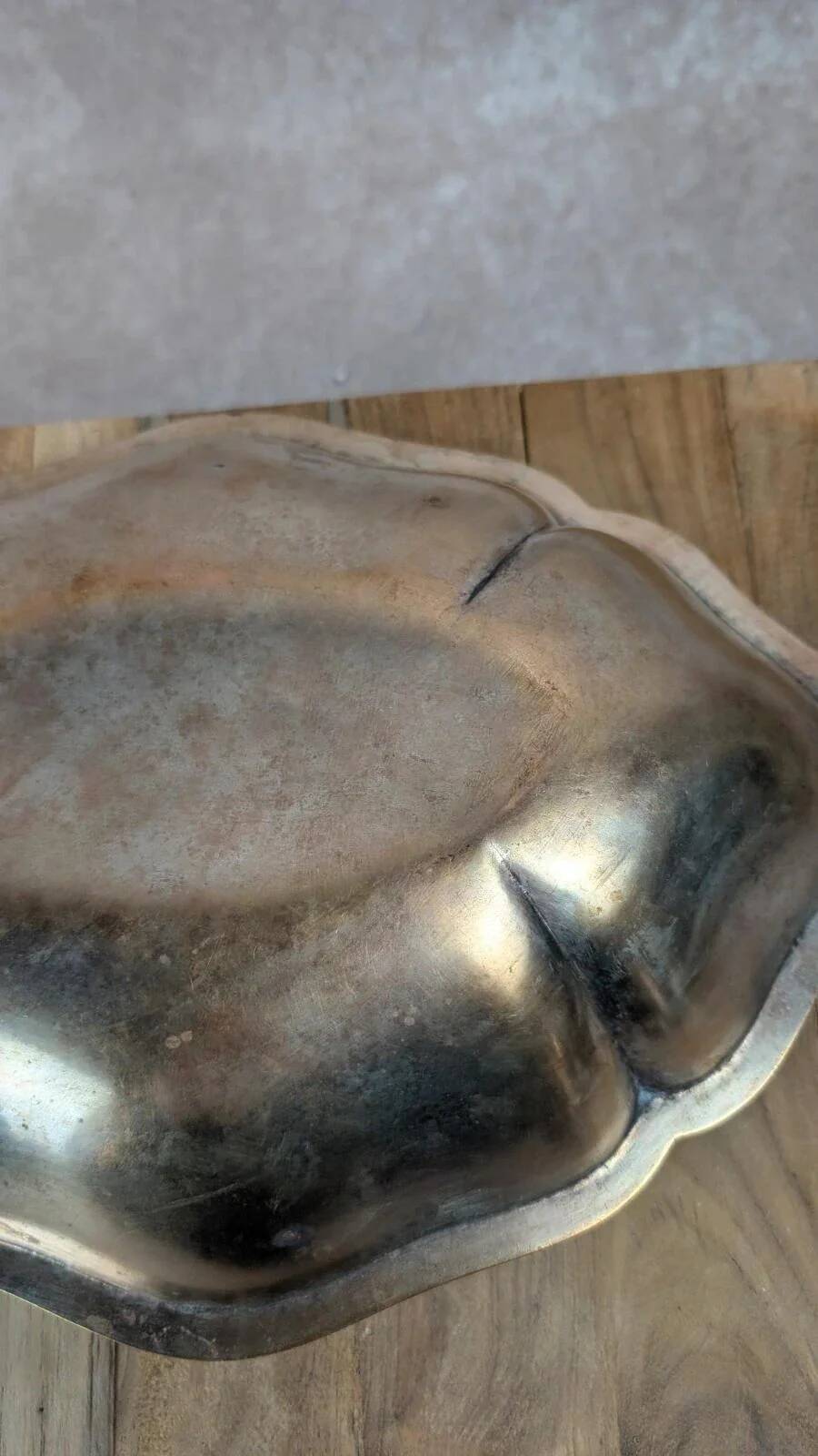 Antique oval silver-plated copper tray with handles.