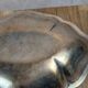 Antique oval silver-plated copper tray with handles.