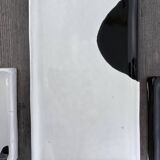 Lot of 4 rectangular glazed terracotta plates.