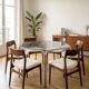 Vintage hexagonal table with smoked glass top and chrome metal structure.