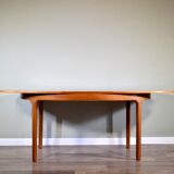 Midcentury oblong teak extending table by Nathan