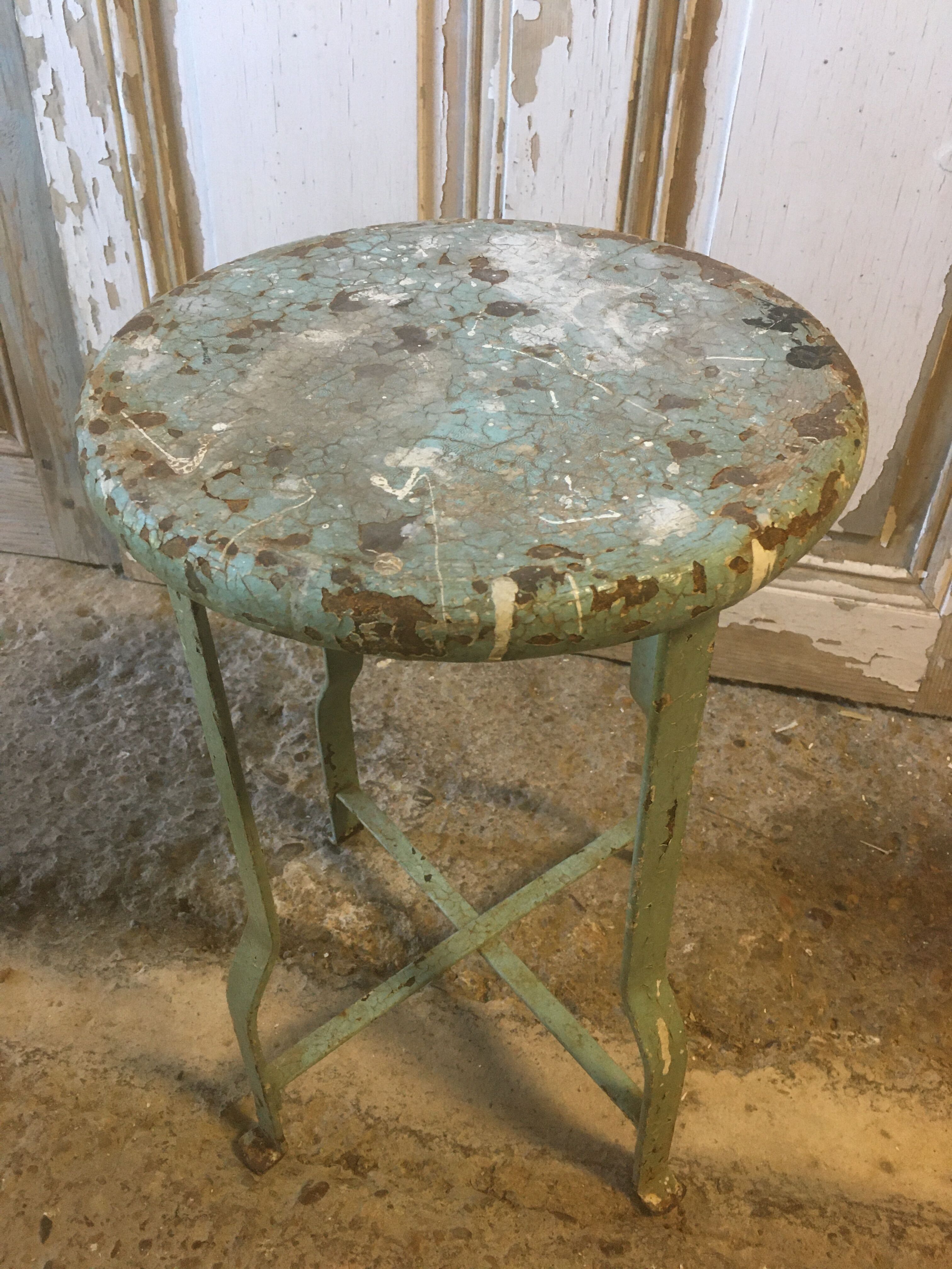 Patinated metal industrial stool