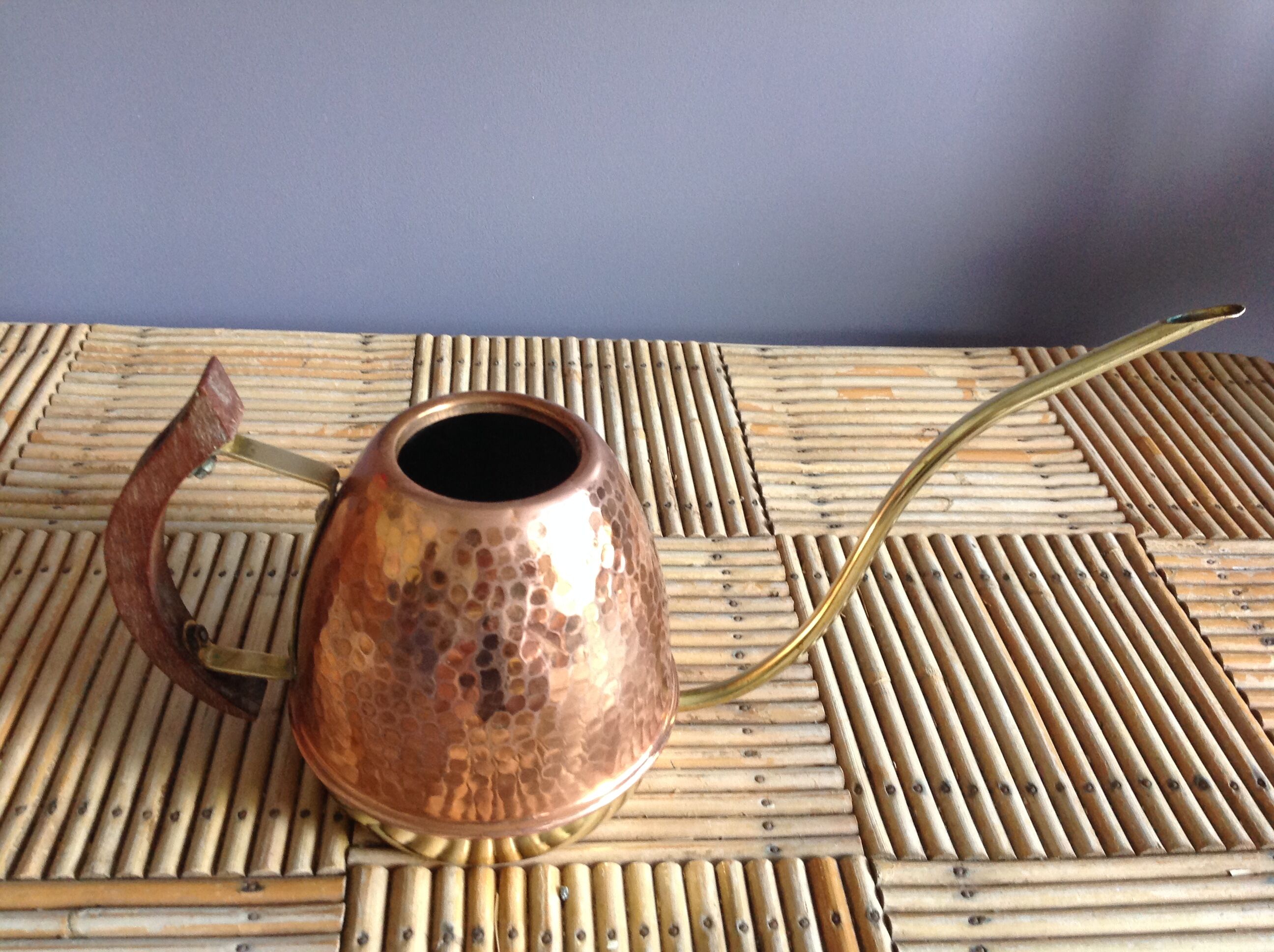 Copper and brass watering can