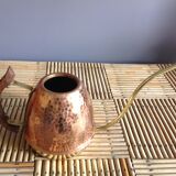 Copper and brass watering can