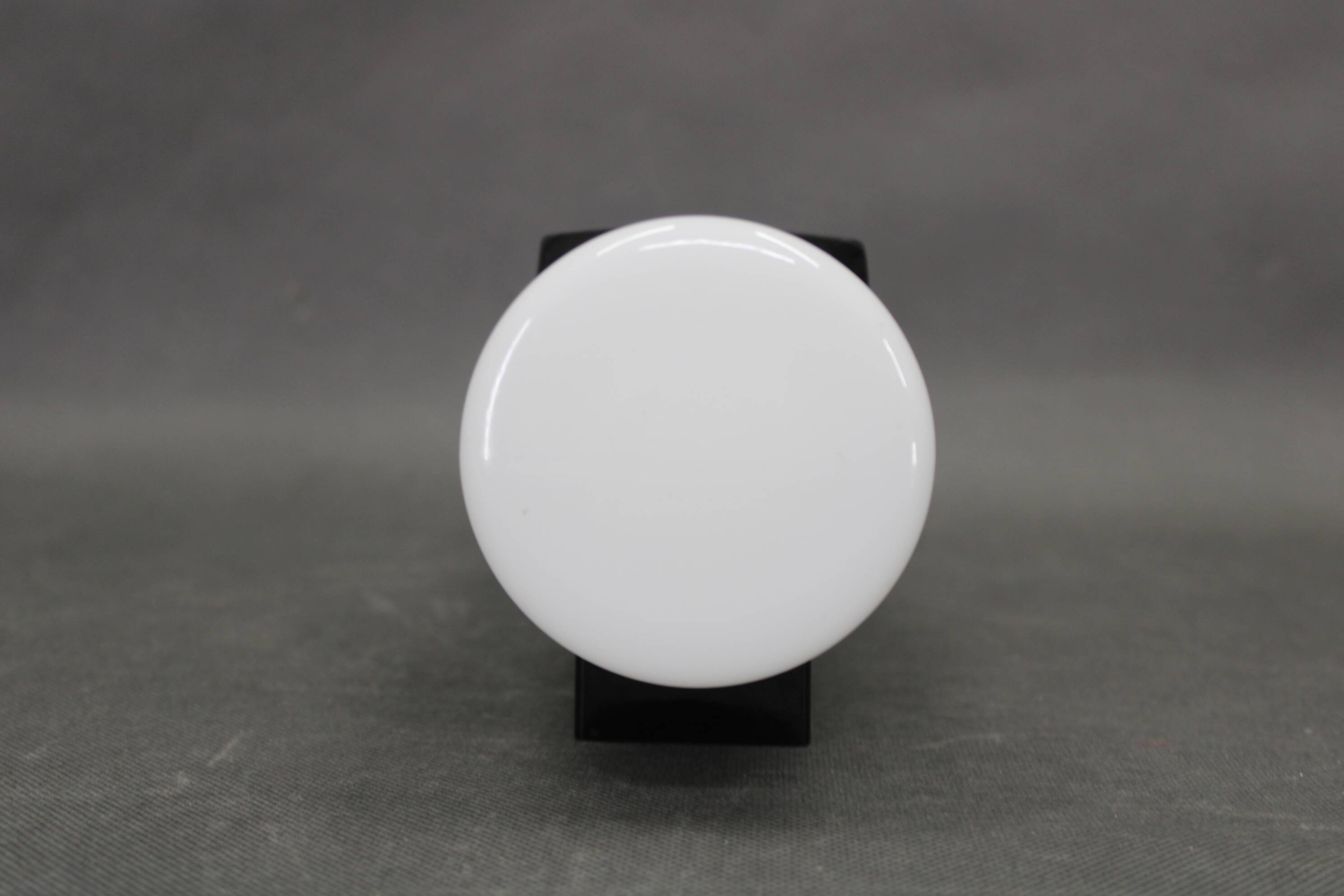 Mid-century Bakelite and opaline glass wall light, Czechoslovakia 1960s