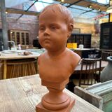 Child bust in terracotta