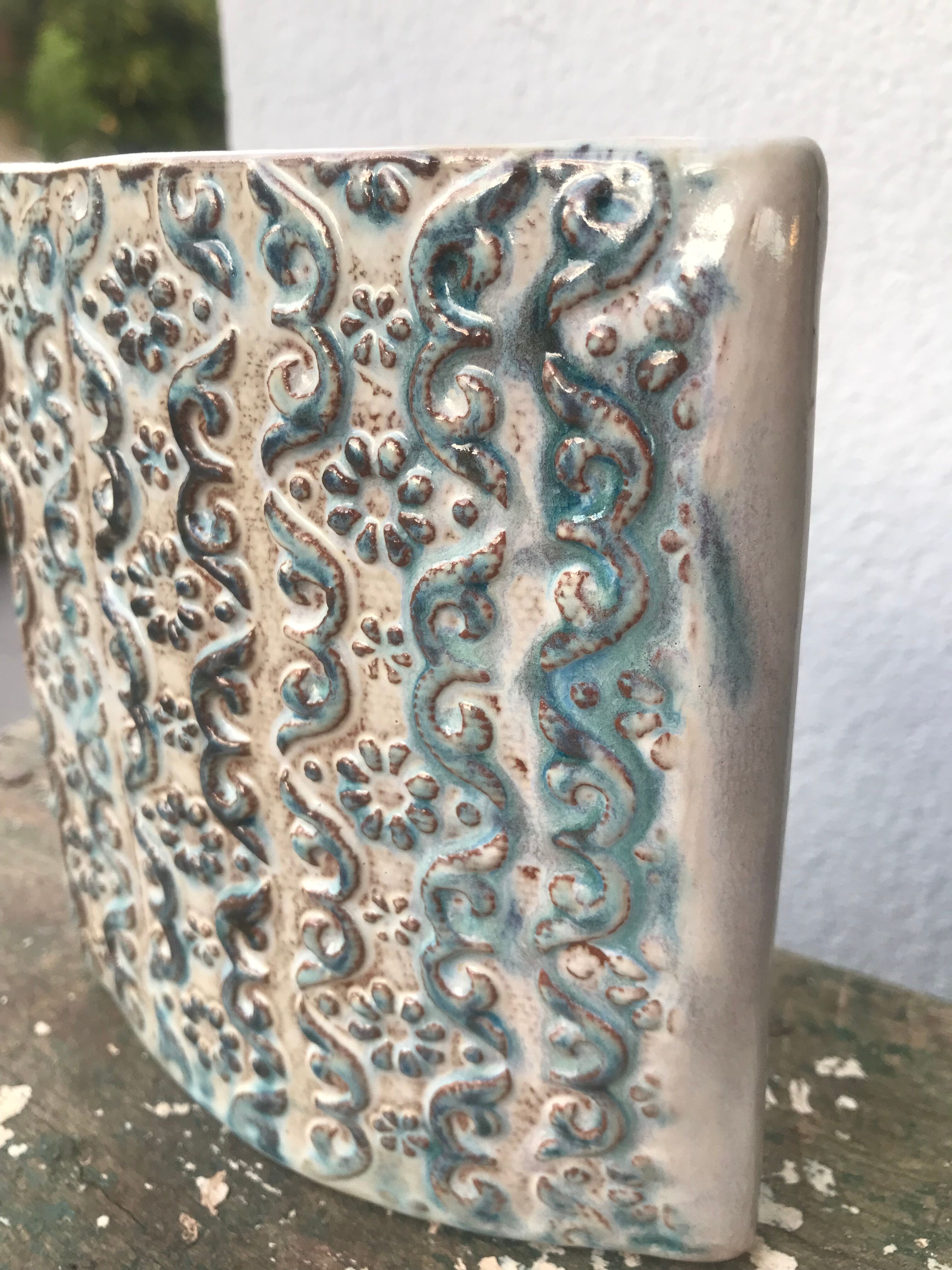 Vintage ceramic vase, decorated relief