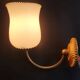 Pair of vintage gold-tone wall sconces with opaline glass globes