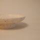 Travertine pocket emptier