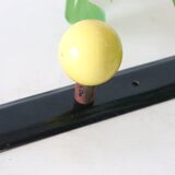 Wall-mounted coat rack, metal and colored wooden hook, 1960