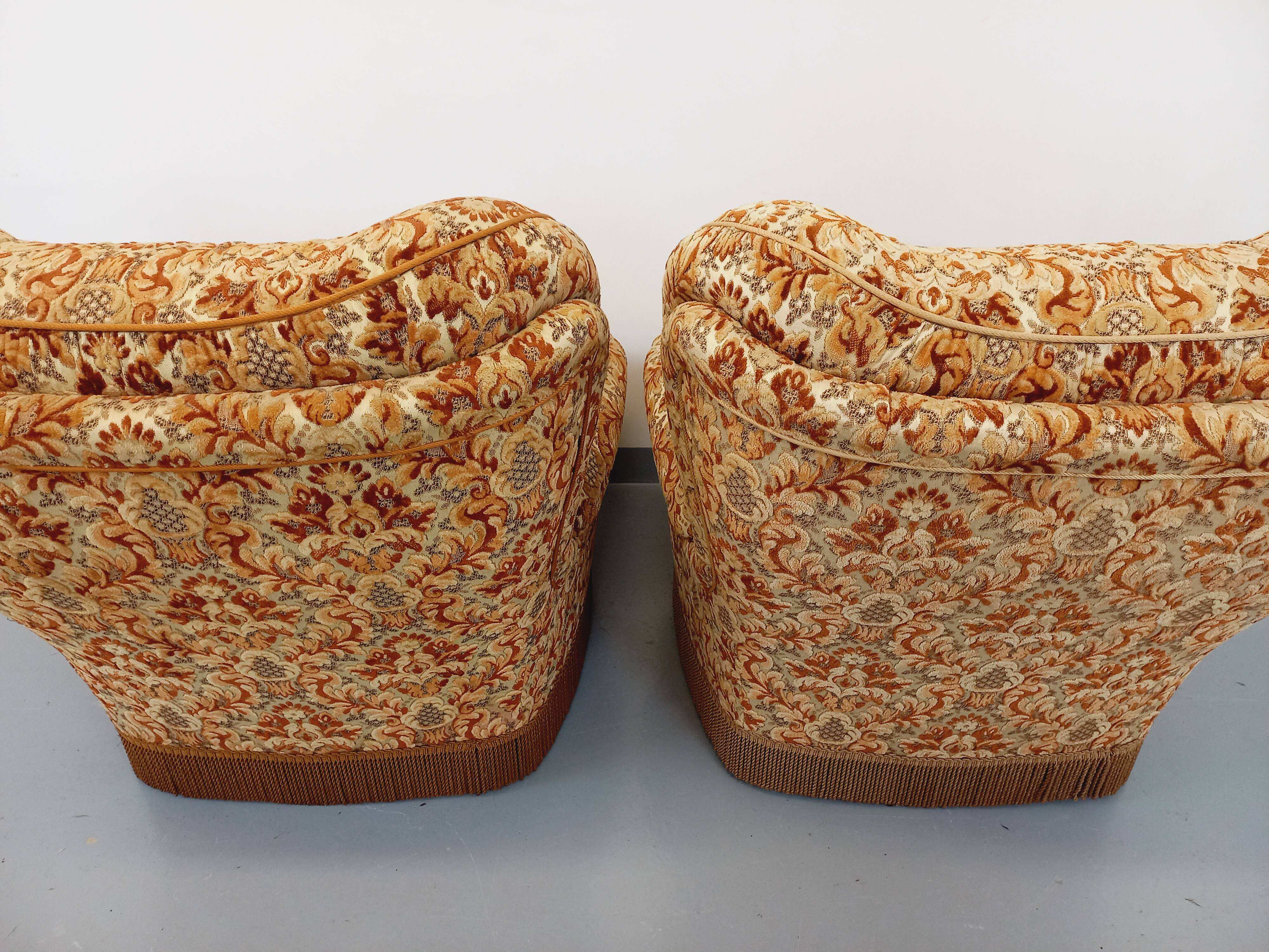 Set of 2 vintage armchairs in floral fabric with fringes from the 60s 70s