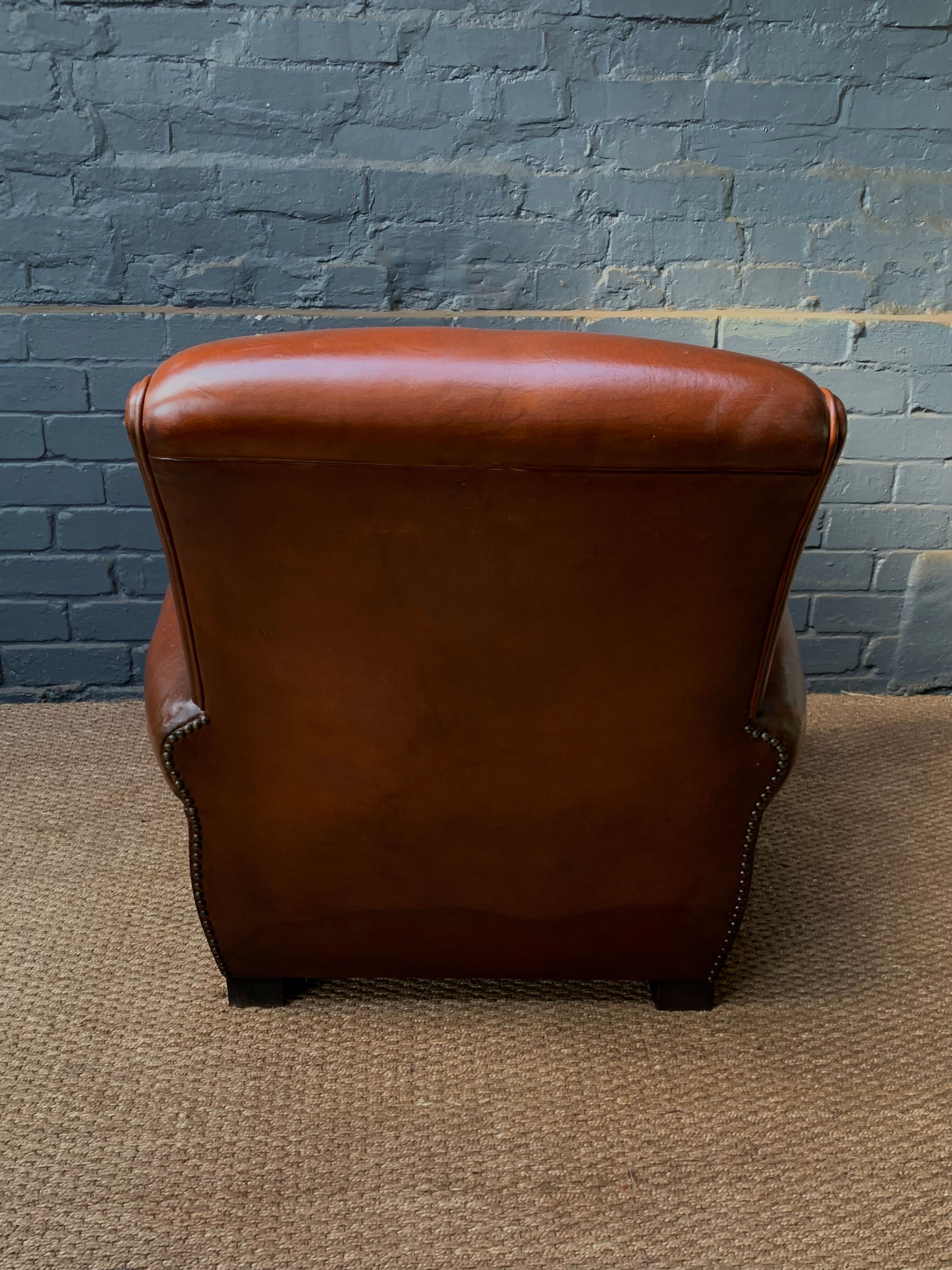 French, leather club chair, havana lounge model circa 1950's