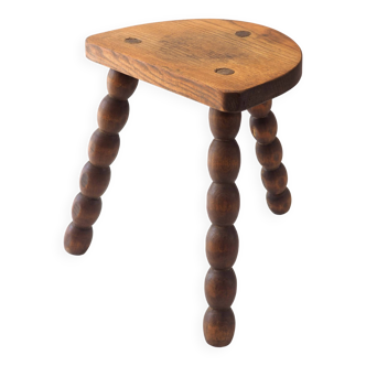 Tabouret tripode perlé