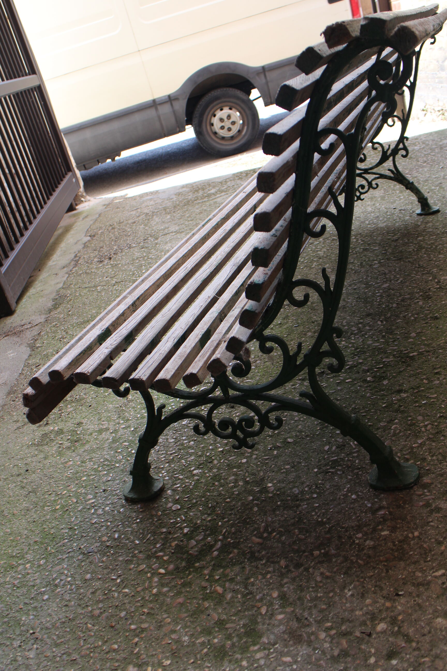 Old bench cast iron base and wooden slats