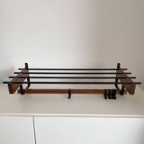 Vintage Scandinavian wall coat rack in wood and metal.