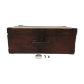 Old wooden suitcase with a padlock