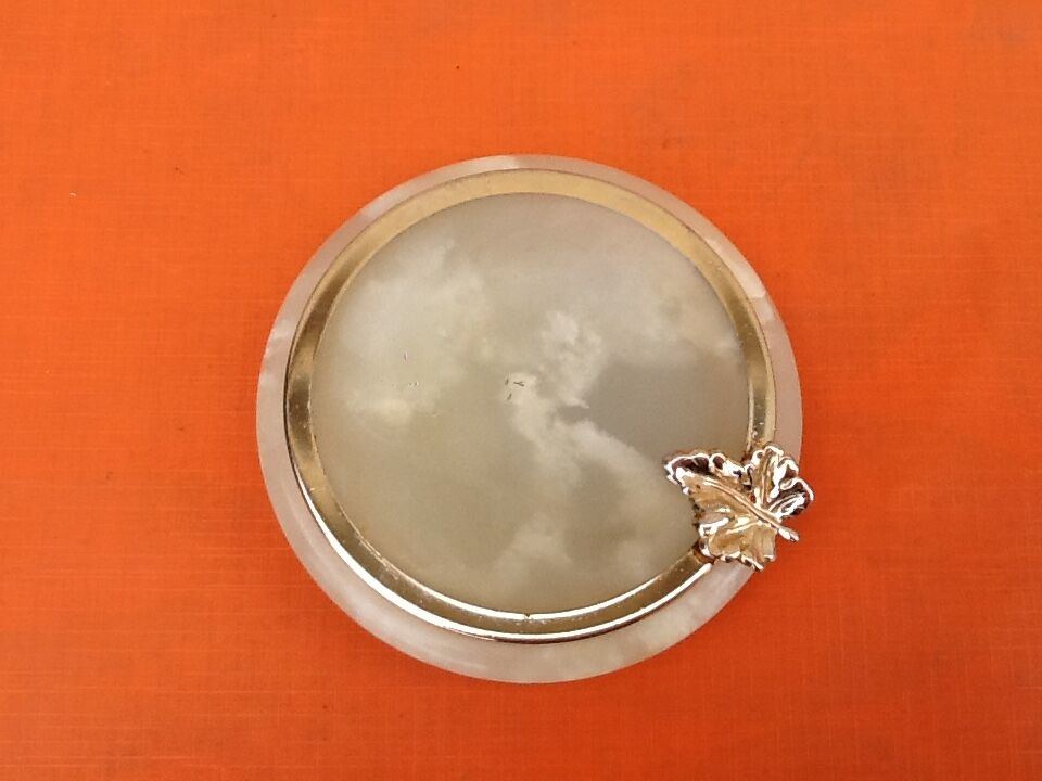 1970s onyx ashtray golden metal strapping