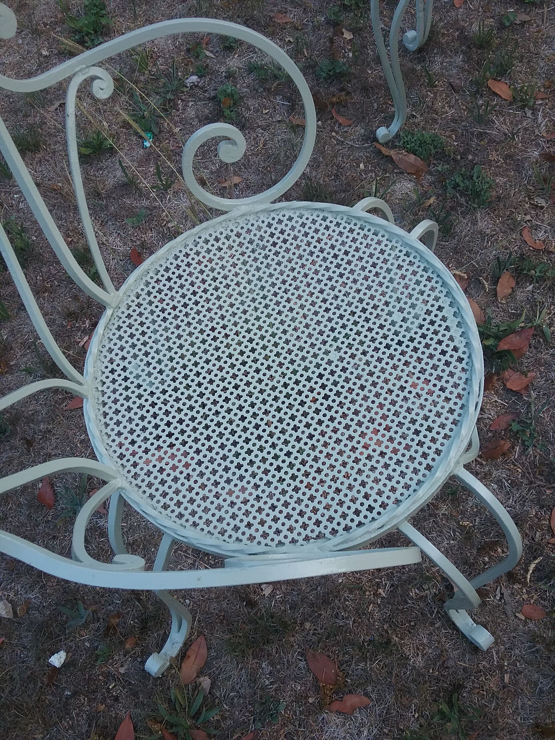 Garden furniture in green wrought iron