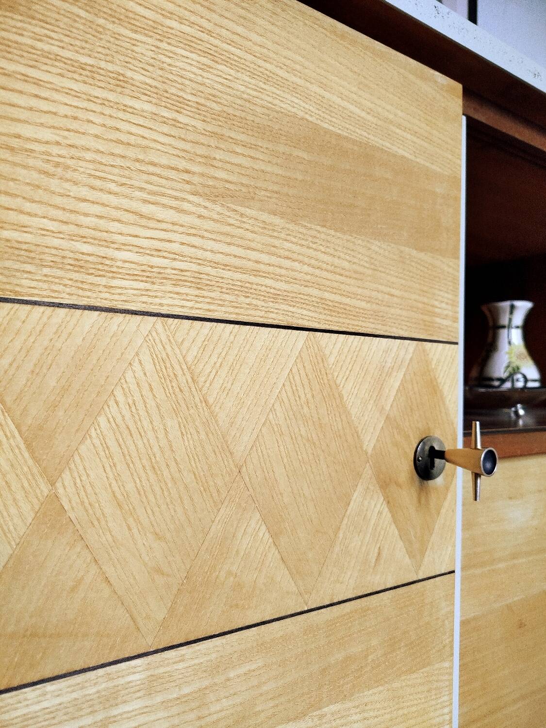 Wooden sideboard in soft green