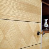 Wooden sideboard in soft green