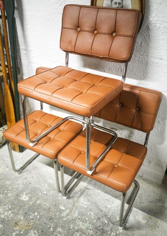 Pair of cantilever chrome and skaï chairs