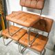 Pair of cantilever chrome and skaï chairs
