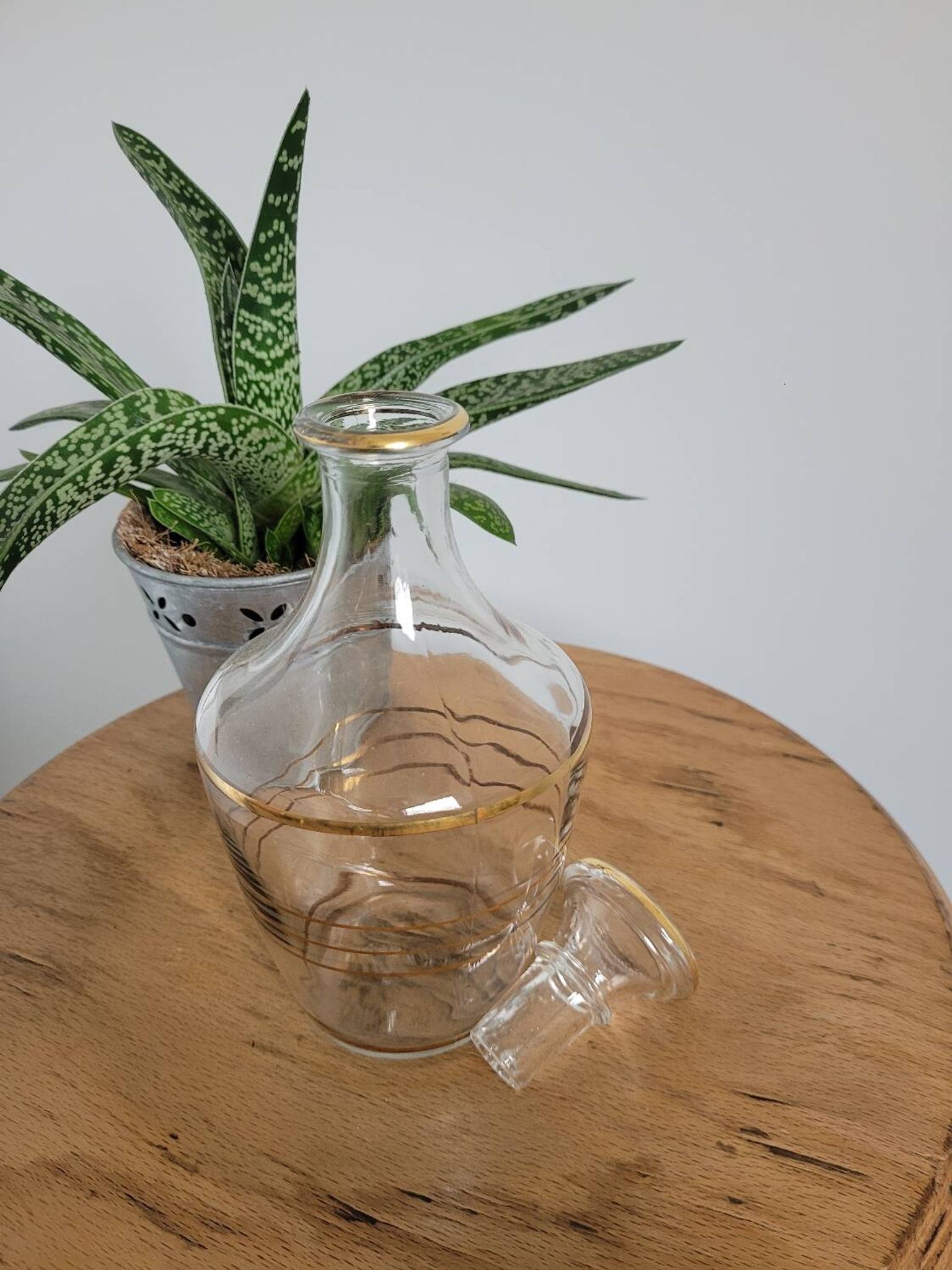 Small glass bottle with gold edges