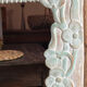 Carved wooden mirror