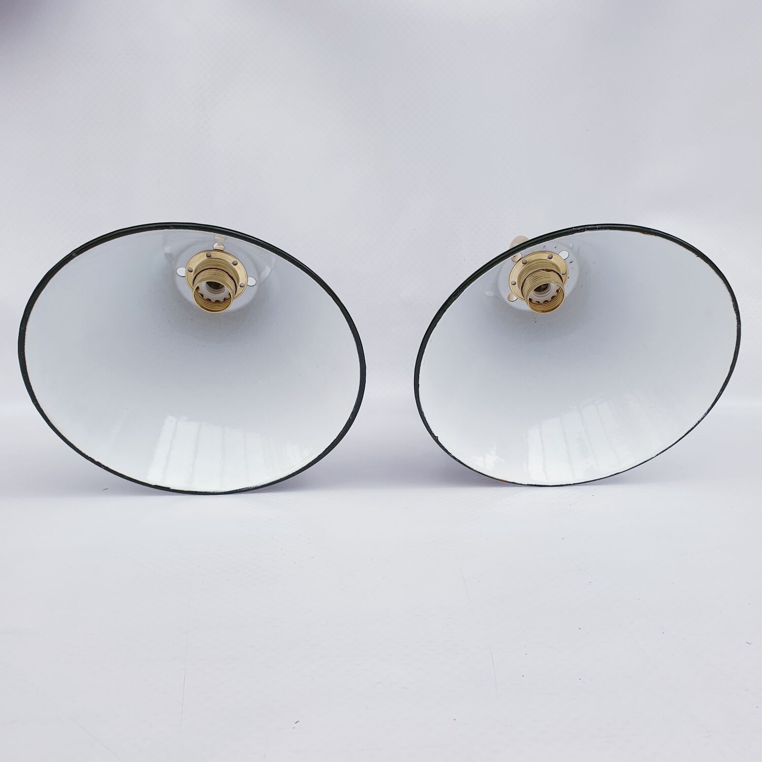 Pair of antique enamelled sheet metal wall lights