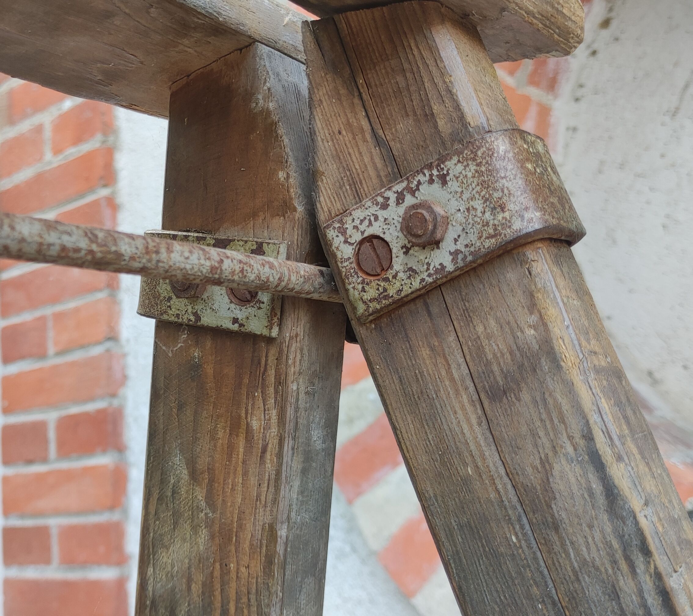 Old wooden stepladder stamped