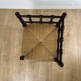 Corner chair in carved wood and straw, late 19th century.