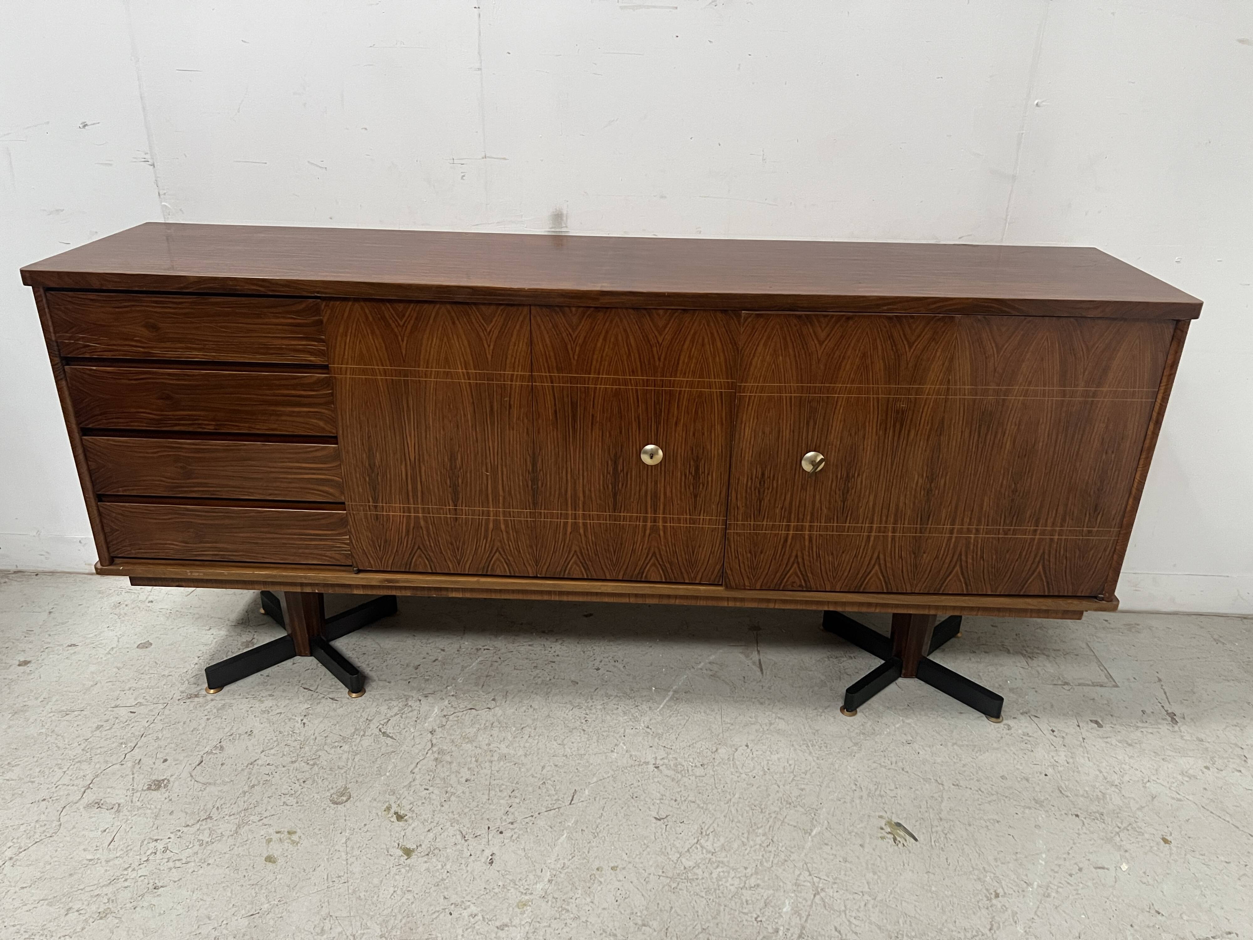 Scandinavian enfilade in veneered wood with iron legs, 20th century.