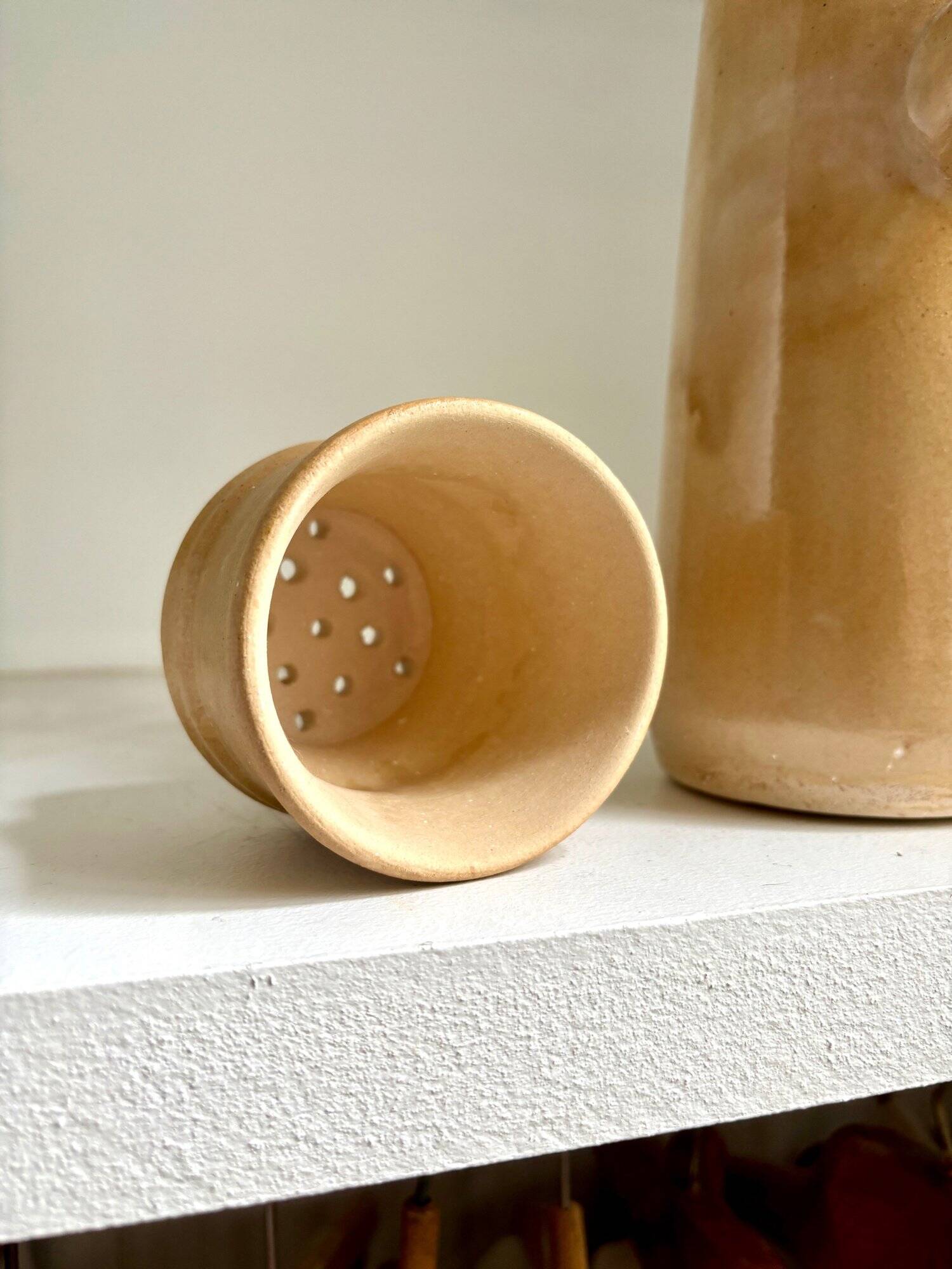 Beige enameled stoneware teapot