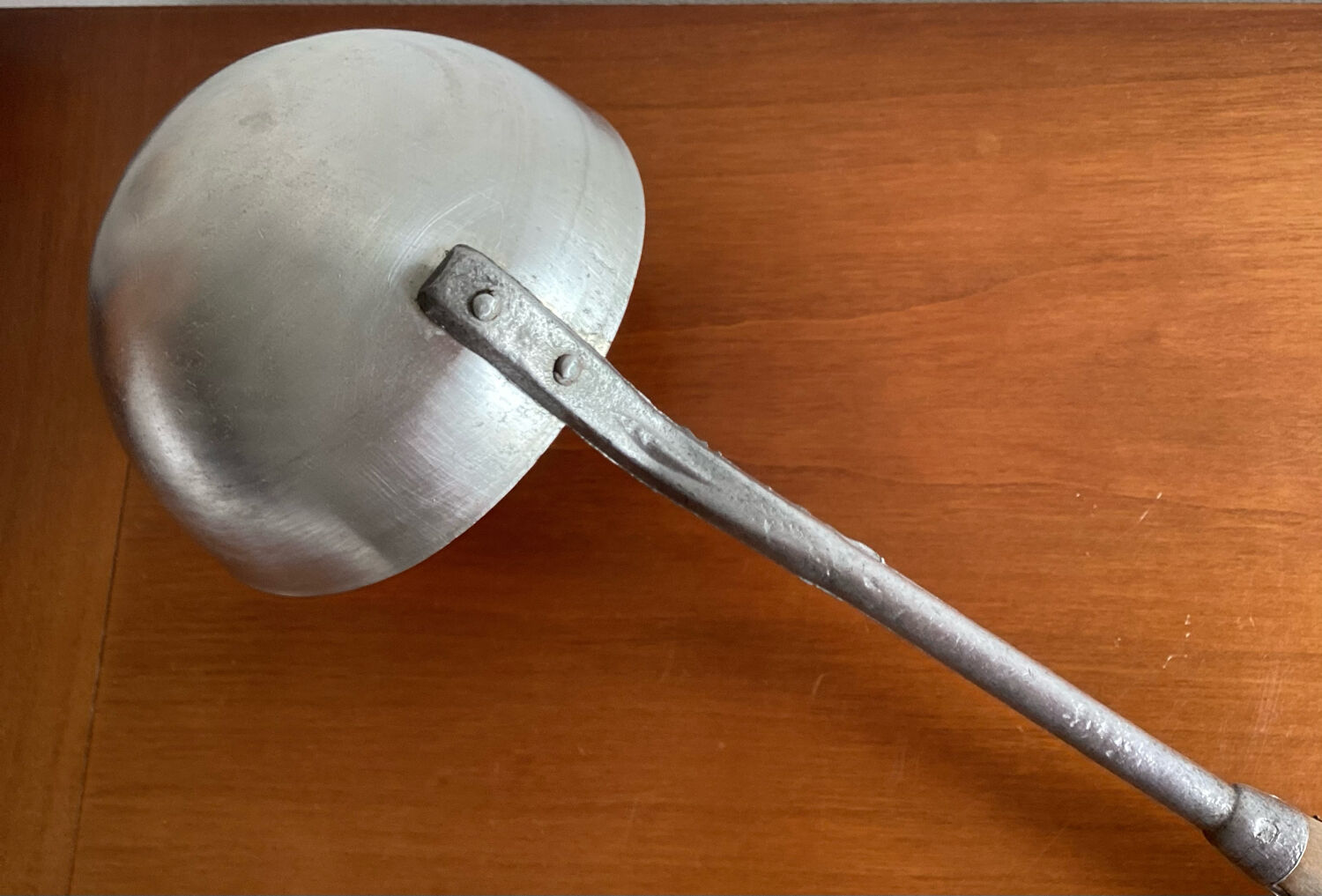 Old ladle aluminum wooden handle