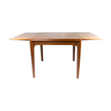 Dining table with extentions in teak designed by Henning Kjærnulf from the 1960s.